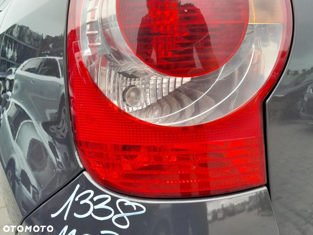 RENAULT MODUS LAMPA TYLNA LEWA W BŁOTNIK - 2