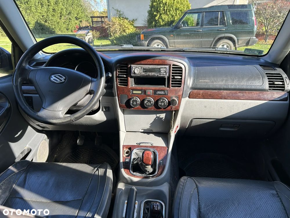 Suzuki Grand Vitara 2.0 - 7
