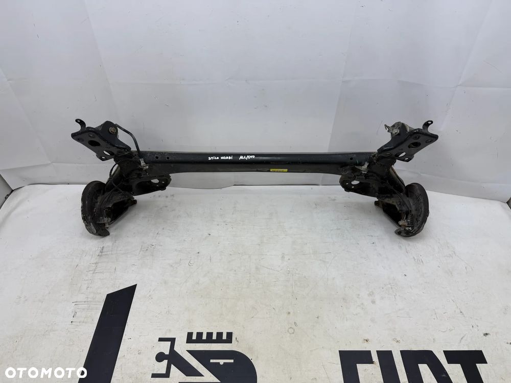 OŚ BELKA TYŁ TYLNA FIAT STILO KOMBI - 1