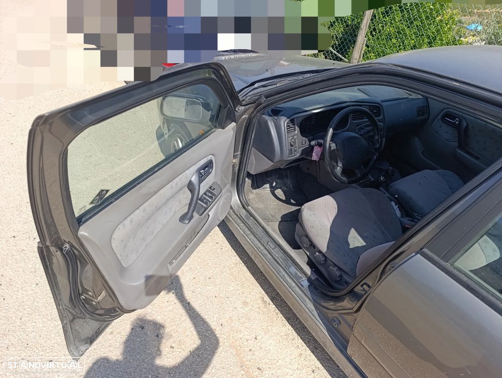 Nissan Primera 1.6 Comfort - 14