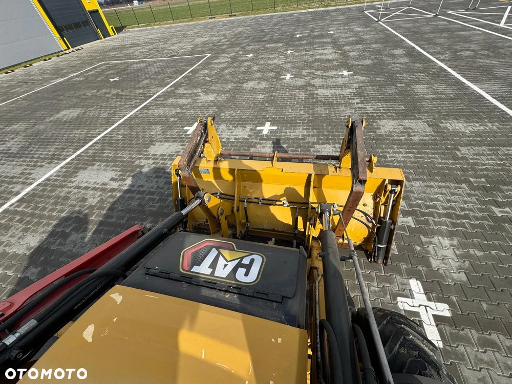 Caterpillar 428 - 11