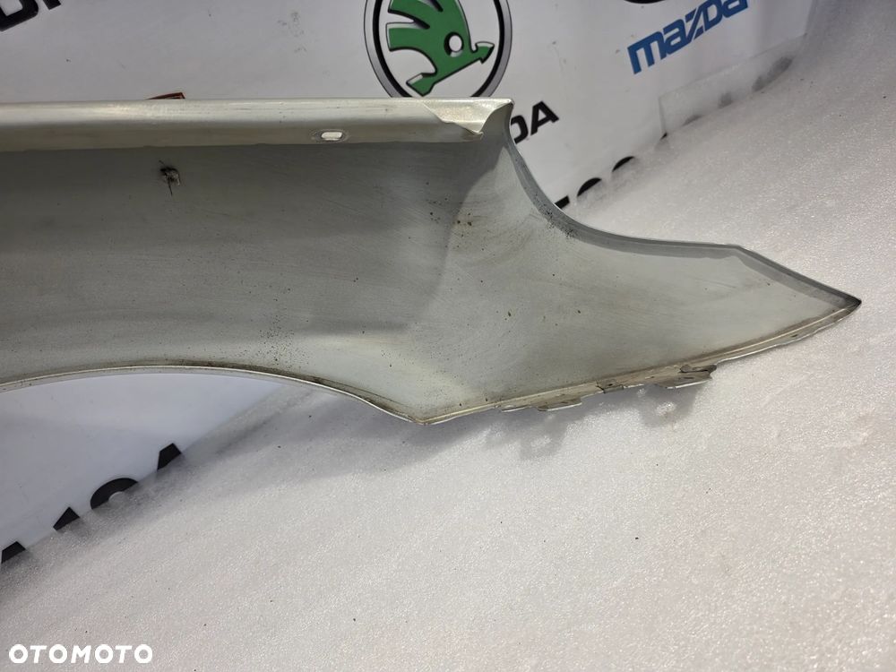 BMW E60 / E61 LEWY BŁOTNIK PRZEDNI PRZÓD NR AUKCJI BŁ232 - 25