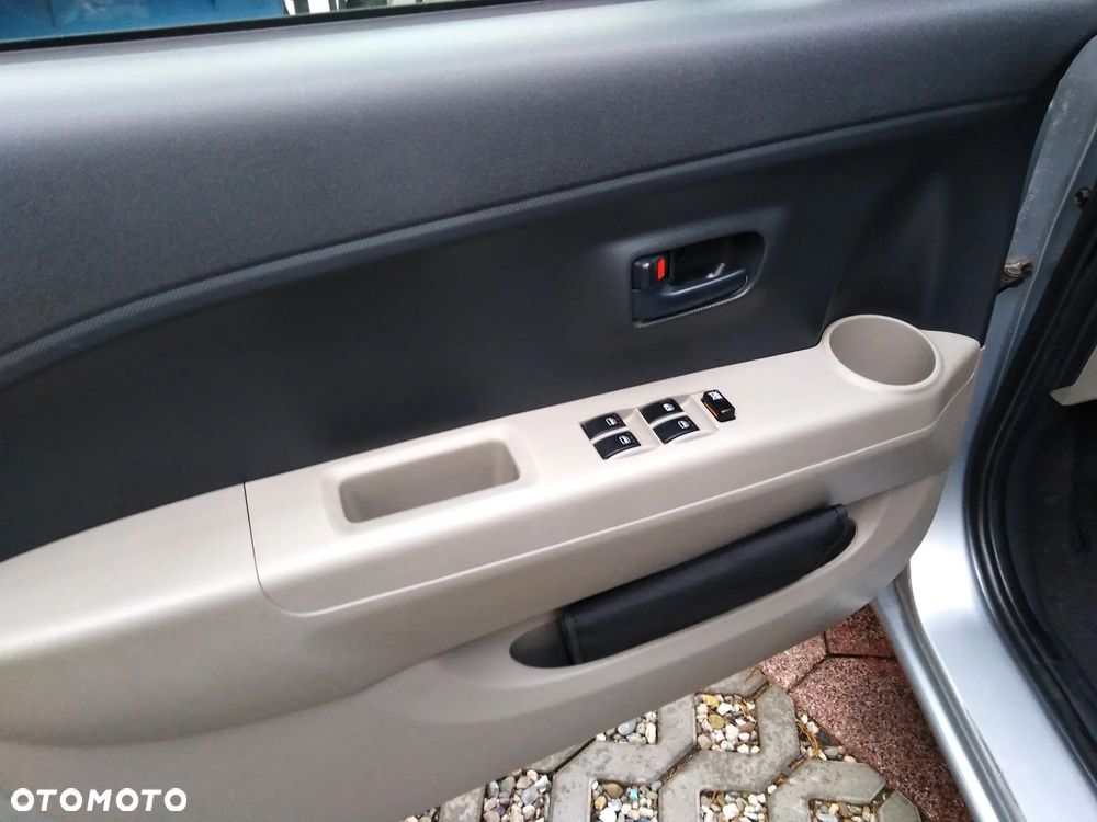 Daihatsu Sirion 1.0 - 13