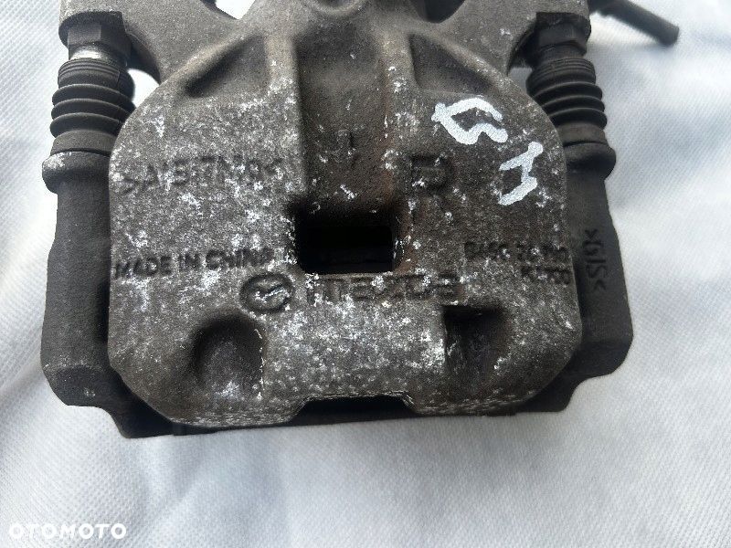 ZACISK HAMULCOWY PRAWY/LEWY TYŁ MAZDA3 3 bm 13-18R - 2