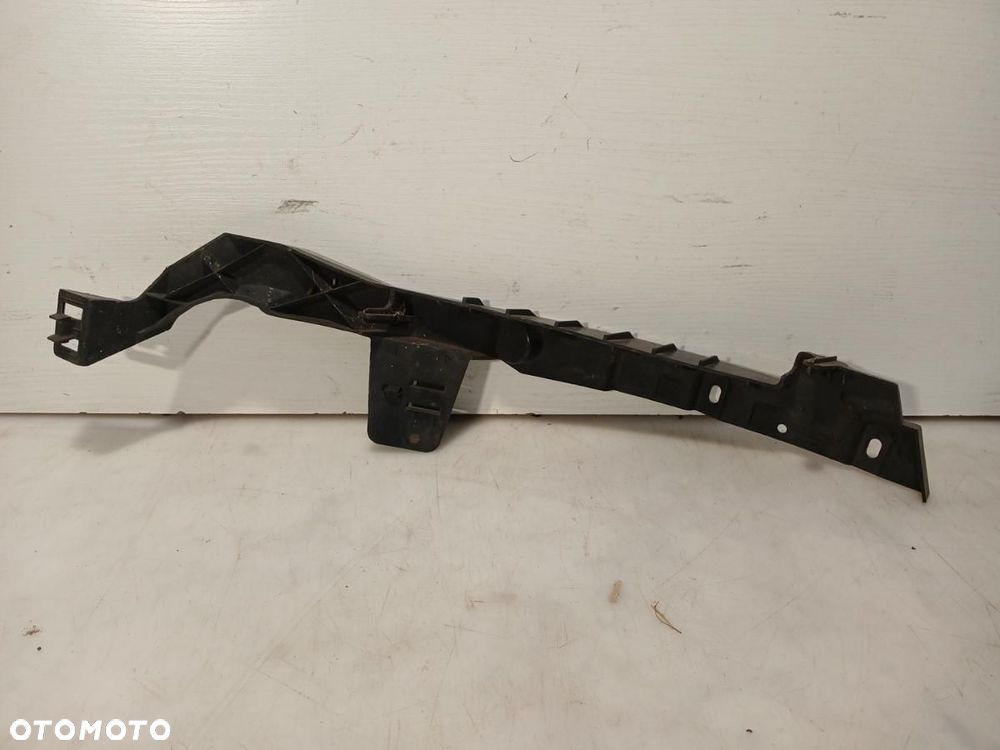 ŚLIZG MOCOWANIE LAMPY ZDERZAKA LEWY PRZÓD OPEL ASTRA J IV 09-12r. 13287639 - 2