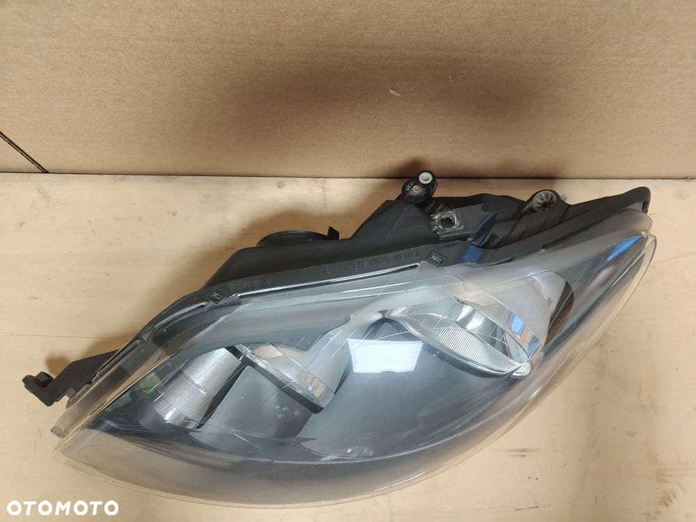 VW Golf 5 V Plus lewy reflektor lampa Europa - 2