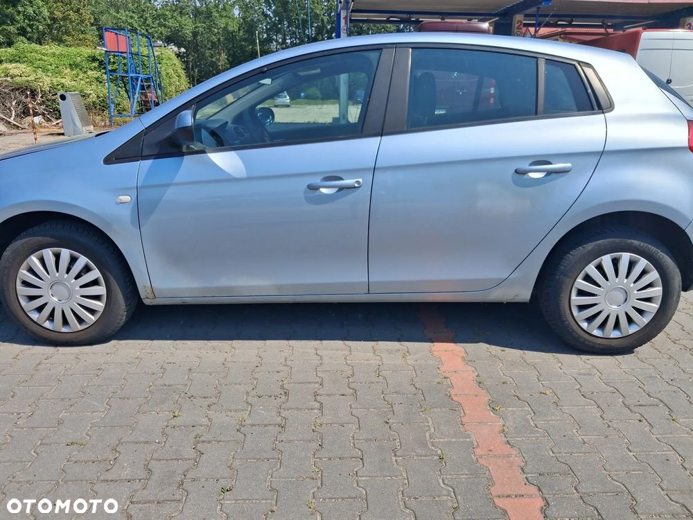 Fiat Bravo II 2 silnik kompletny 1.9 JTD Multijet diesel 192A8000  198AXB1A  skrzynia biegów sprzęgło dwumasa drzwi klapa błotnik lusterko lakier 336/B morski niebieskie lewarek wybierak stacyjka sterownik moduł wiązka zbiorniczek alternator rozrusznik maglownica przepływomierz wąż przewód obudowa osłona atrapa podszybie mechanizm silniczek głośnik radio konsola wyświetlacz zegary moduł komfortu szyba mcperson amortyzator sprężyna sanki wahacz tłumik wydech kolektor zacisk hamulcowy pompa pompka ABS półoś hak holowniczy lampa czujnik parkowania fotele panel sterowania klimatyzacji wykładzina kierownica manetki zwijak Air bag schowek konsola zamek klamka wspomaganie NA CZĘŚCI wszystkie części - 3