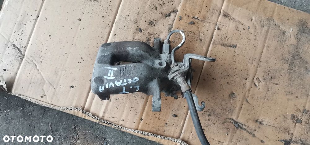 ZACISK LEWY TYŁ OCTAVIA II - 1