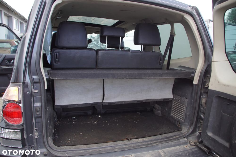 Auto na części 692106889 Mitsubishi Pajero IV 3.2 DID LIFT 4M41U 200KM 2014 krótki zderzak lampa felgi skrzynia silnik głowica deska amortyzator błotnik skrzynia wydech tłumik ćwiartka lampa klapa szyba tylna fotele - 5
