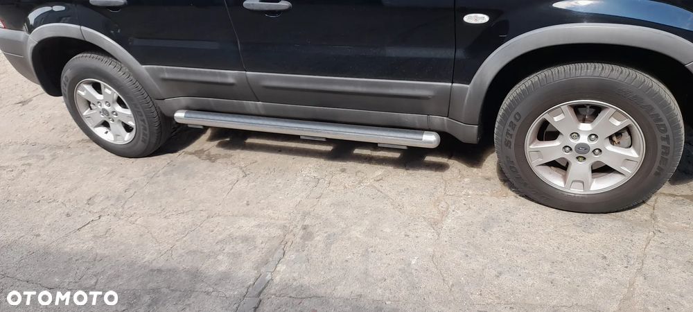 FORD MAVERICK  felgi alu 4 koła z oponami 16 kpl - 8