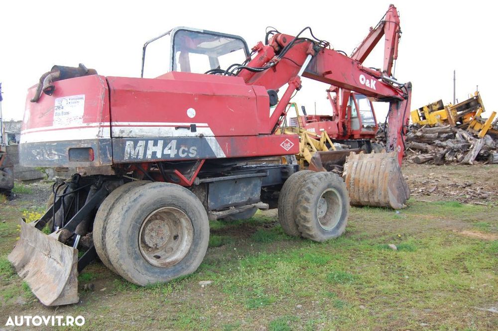 Dezmembrez O&K MH 4 cs - 3