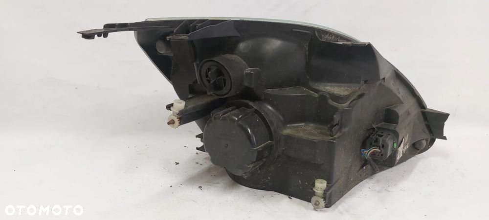 .  PRZOD PRZEDNIA LAMPA LEWA FORD FIESTA MK5 - 5