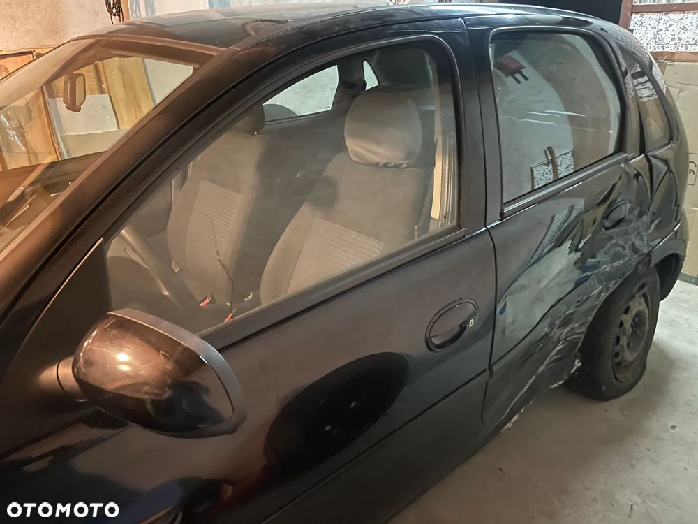 Opel Corsa 1.2 16V Enjoy - 11