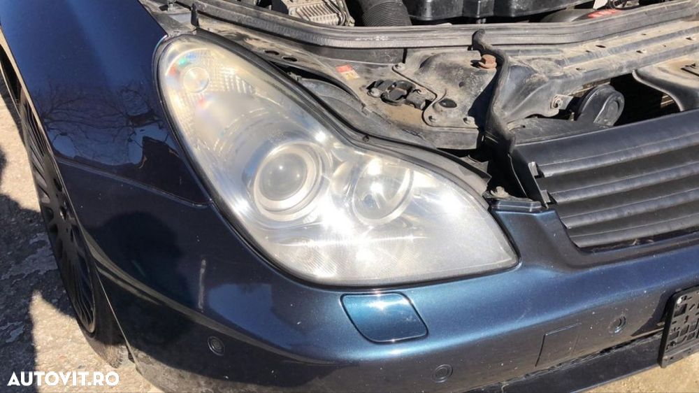Piese mercedes CLS w219 500 motor  V8 Benzina 306 cp  2005 far bixenon adaptiv faruri aripa fata oglinda usa luneta geam kit airbag airbaguri volan interior pompa Frână abs  SBC radiator trager tragar calandru dezmembrari dezmembrez perne amortizor compresor aer airmatic w211 - 2