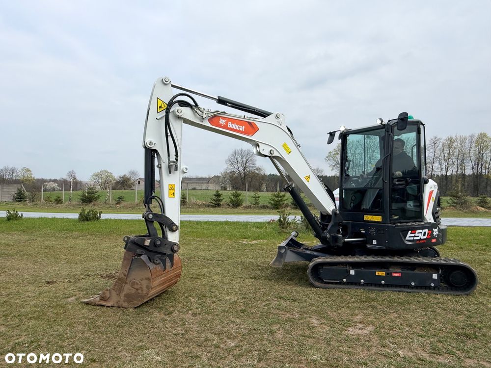 Bobcat Minikoparka Bobcat e50Z 5ton e55 e60 Cat 303.5 304  305 3xłyżki Ramię LOONG dodatkowe linie hydr wyjścia AUX1 + 2 przeciw waga MAX-dociążenie gąsienice 85% od nowości 1 właściciel z Niemiec Auto IDLEE po serwisie Widły wiertnica grabie i inne za dopłatą Szybkozłącze hydr Miller łyżka przedsiębierna Pług  Kubota Takeuchi Jcb - 21