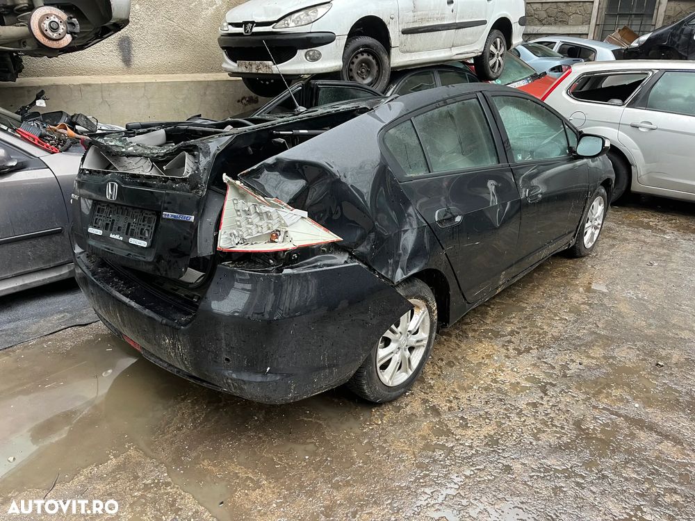 Dezmembrez Honda Insight Hybrid 1.3 i-VTEC CVT 88CP negru automat - 2