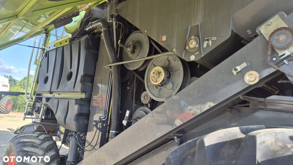 Claas Lexion 660 z hederem - 9