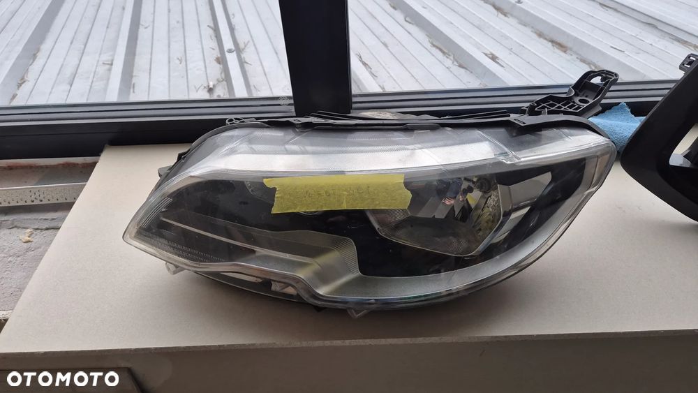 REFLEKTOR LEWY LEWA LAMPA PEUGEOT 301  9817298380