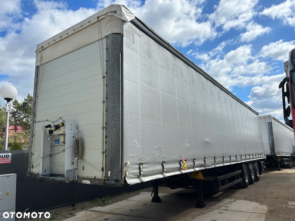 Schmitz Cargobull FIRANKA / 20 SZTUK DO WYBORU / BARDZO ŁADNE OPONY / Z PEŁNYM WYPOSAŻENIEM DO ZAŁADUNKU / 2 KOŁA ZAPASOWE / DOSTĘPNE KOLORY SREBRNY - NIEBIESKI - CZERWONY / NIEKTÓRE MAJĄ NOWE PLANDEKI !! - 1