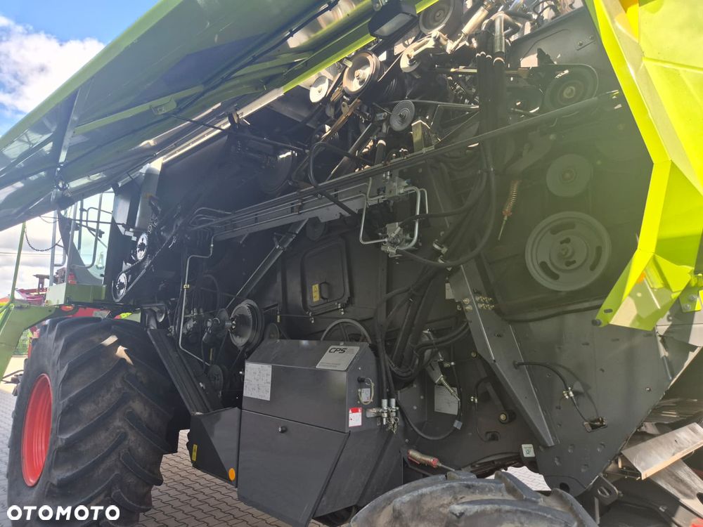 Claas Tucano 440 z hederem Vario 620 i przystawką do kukurydzy Olimac - 13
