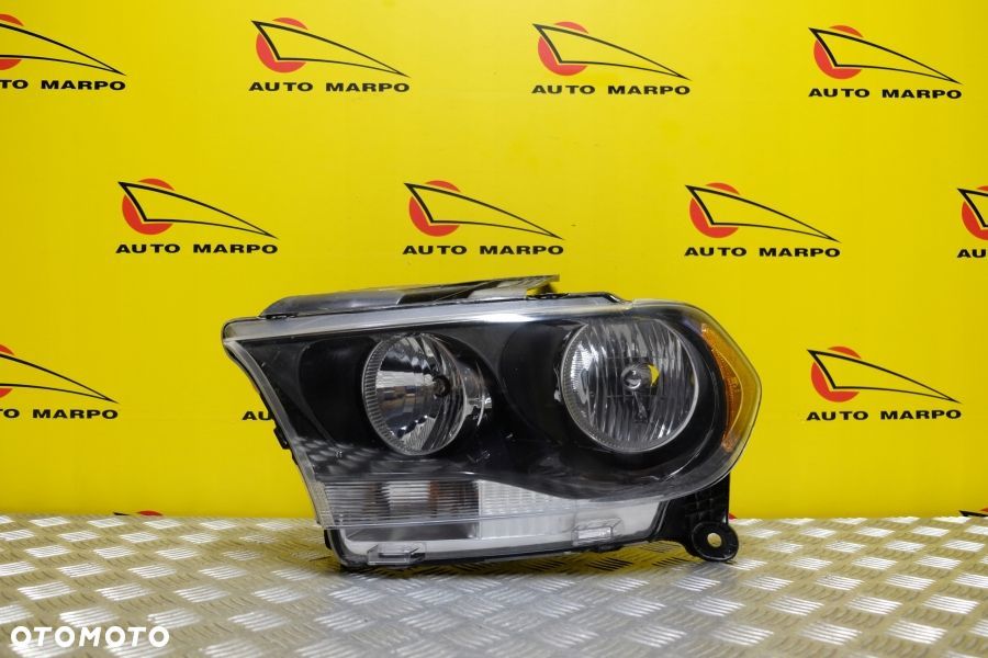 DODGE DURANGO 2011- REFLEKTOR LAMPA ZWYKŁA CIEMNA LEWA USA - 2