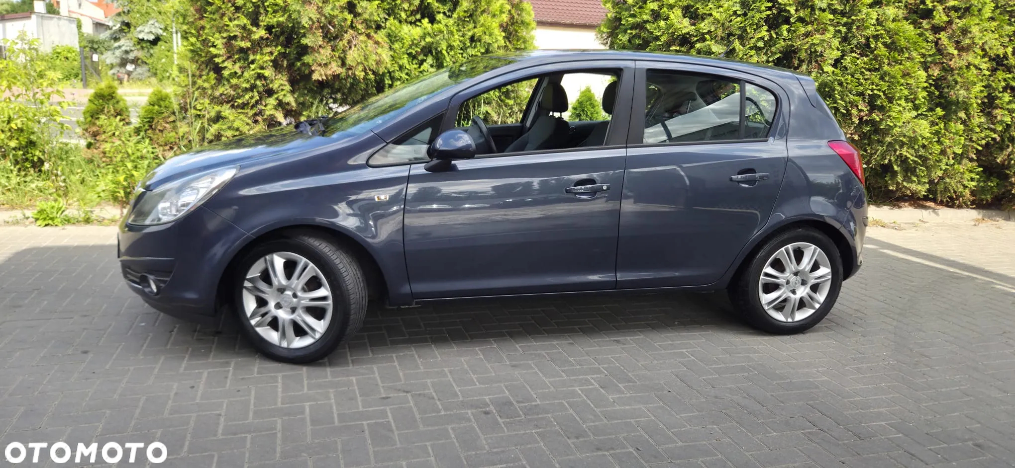 Opel Corsa 1.4 16V Cosmo - 7
