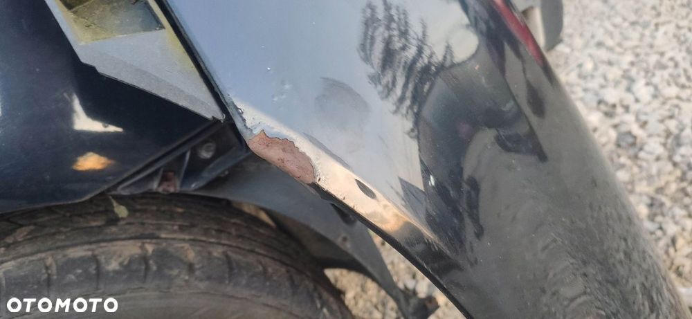 KL BŁOTNIK LEWY PRZÓD SAAB 9-3 SS 03- 298 CZARNA - 2