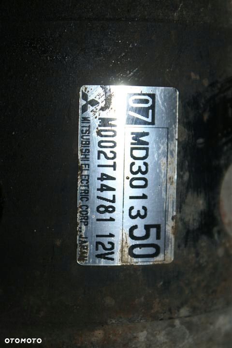 ROZRUSZNIK MITSUBISHI COLT 1,3 M002T44781 MD301350 - 2