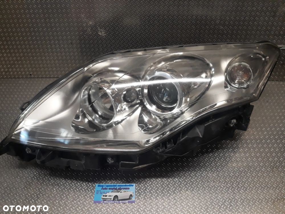 LAMPA LEWY PRZÓD RENAULT LAGUNA III SOCZEWKA  260600033R