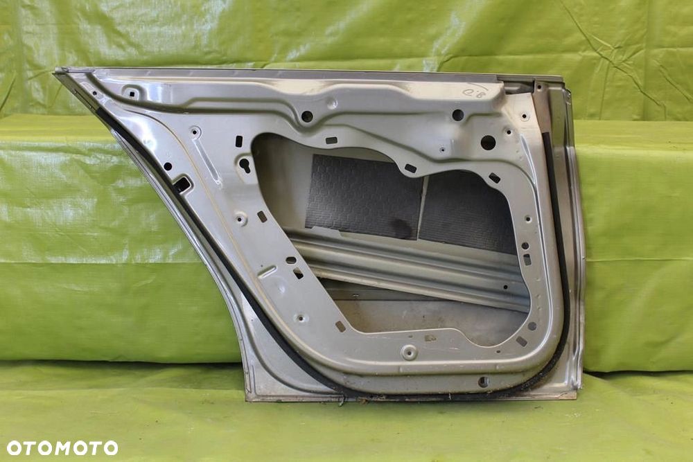 Drzwi Volkswagen Passat CC 2008-2016r. tył lewy - 2