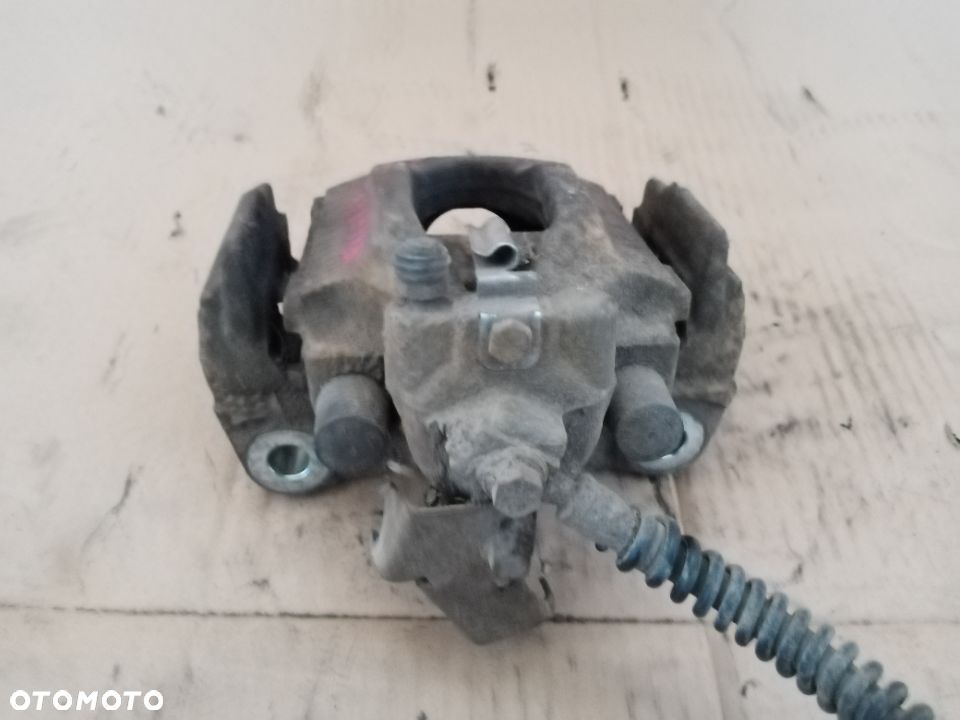 Zacisk hamulcowy lewy tył tylny VW Touareg 7L - 2