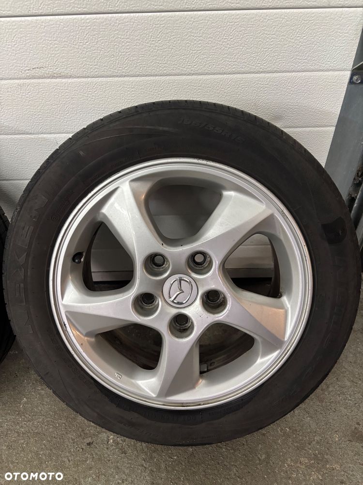 Alufelgi z Oponami Letnimi Mazda 5x114.3 6Jx15 195/55/15 - 6