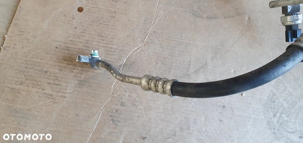 Przewód rurka klimatyzacji klimy Kia Sportage III 2.0 CRDI 97775-3U300 - 2