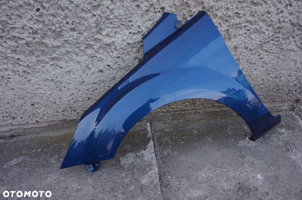 BŁOTNIK LEWY FOCUS II MK2 LIFT 08/11r 36 - 4