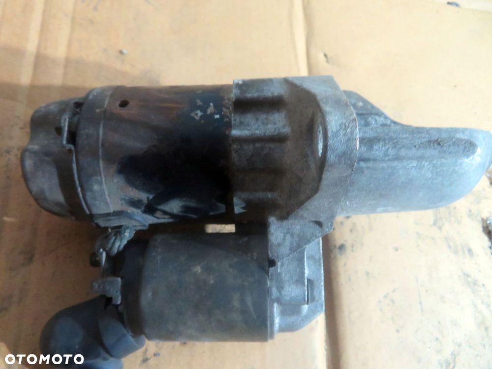 ROZRUSZNIK IMPREZA II GG LIFT 1.5 16V 23300-AA450 M000T30471 SUBARU 2006-2007 - 2