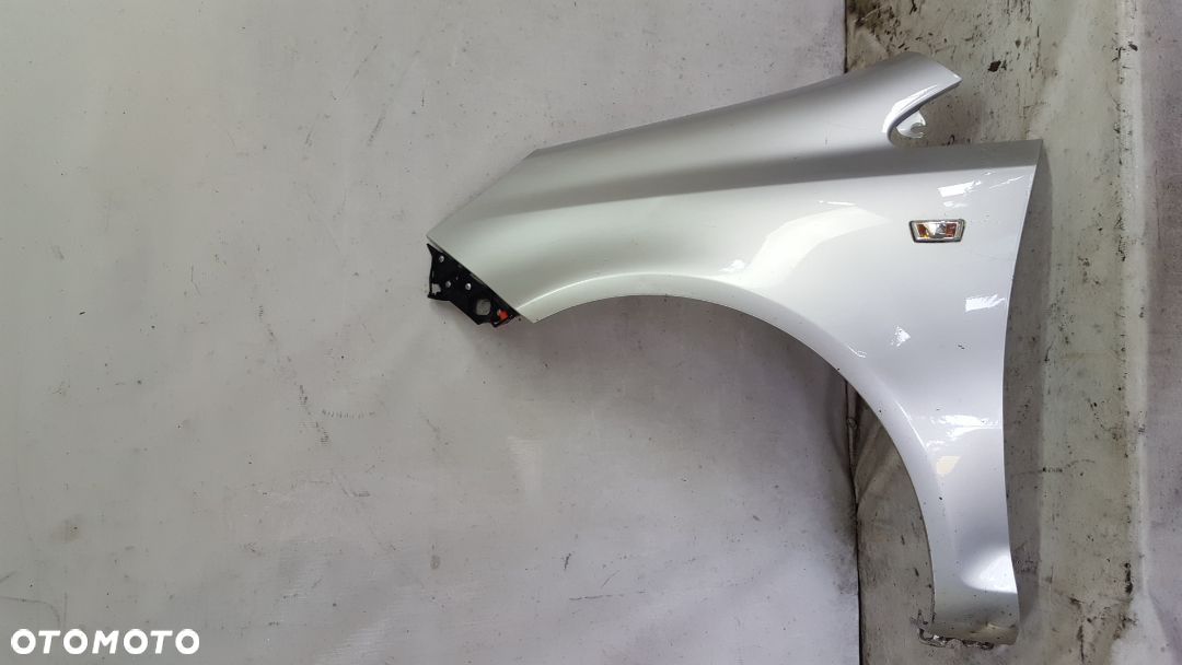 * BŁOTNIK PRZÓD PRZEDNI LEWY OPEL CORSA D Z157 SREBRNY - 1