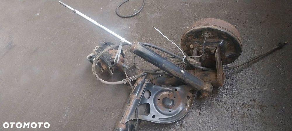 BELKA OŚ ZAWIESZENIA TYŁ BĘBNY Z ABS RENAULT CLIO III 1.5 DCI - 3