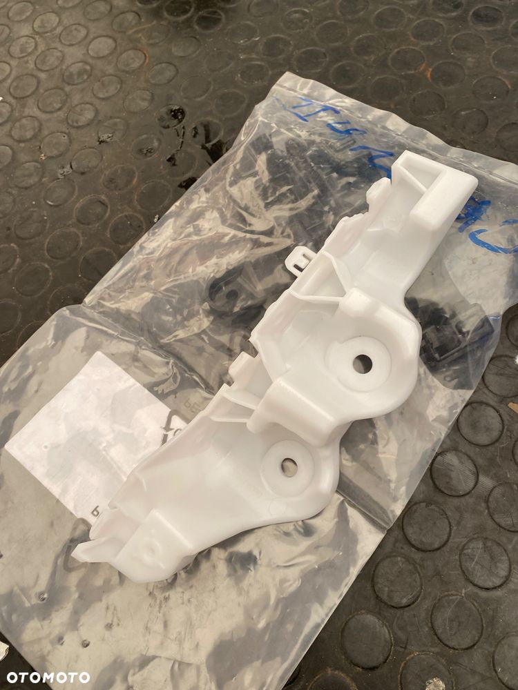 Dacia BIGSTER NOWY ORYGINALNY ! PRAWY ŚLIZG WSPORNIK MOCOWANIE ZDERZAKA BŁOTNIKA  PRZEDNIEGO PRAWY PRZEDNI PRZÓD W zderzak 622209270R - 2