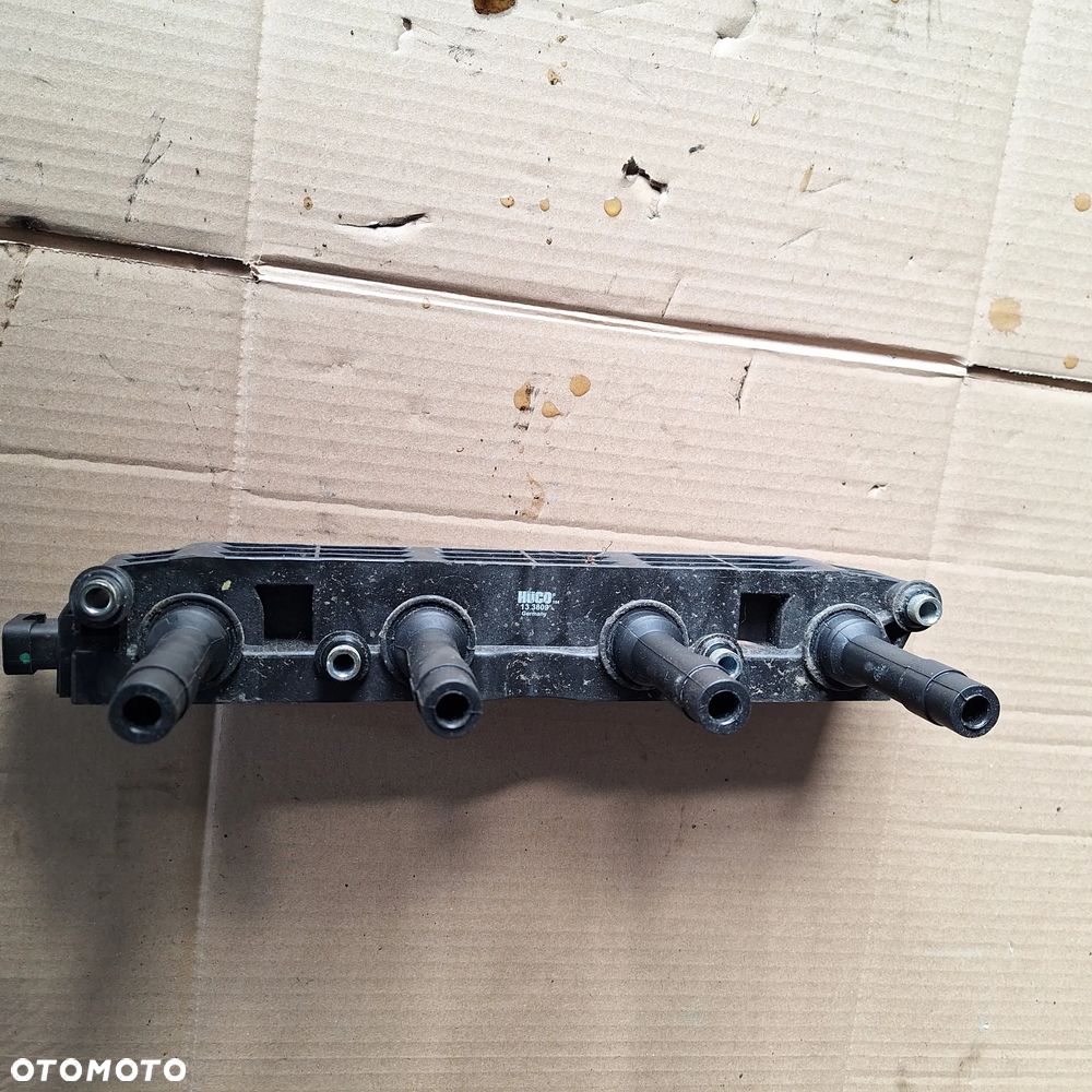 CEWKA ZAPLONOWA CORSA C 1.4 133809 - 2