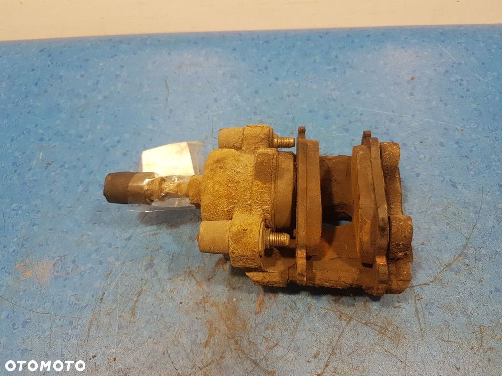 BMW 1 E87 2.0D ZACISK HAMULCOWY TYŁ PRAWY  N47 - 2