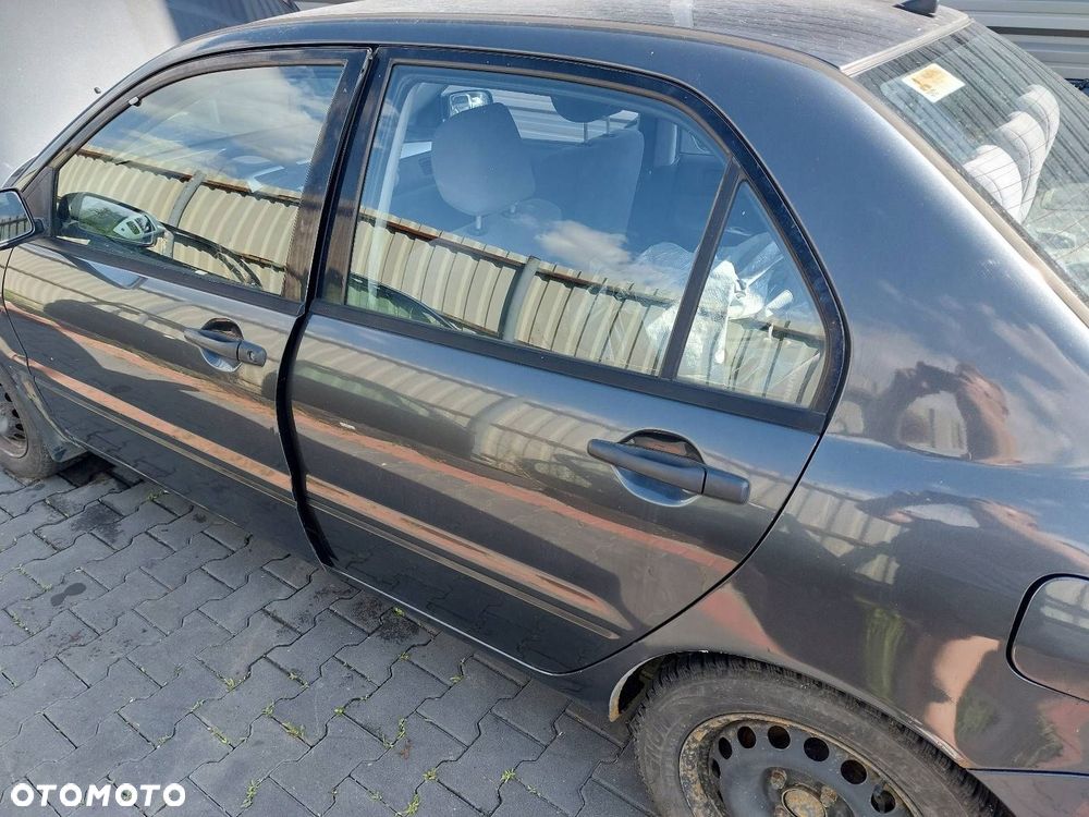 DRZWI KOMPLETNE LEWY TYŁ MITSUBISHI LANCER VII SEDAN A02A - 2