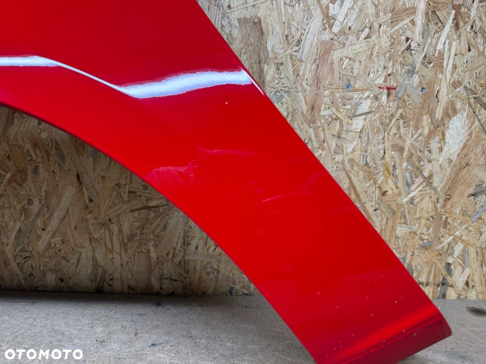 BŁOTNIK LEWY PRZÓD LEWY PRZEDNI OPEL CORSA E CZERWONY 50B - 27