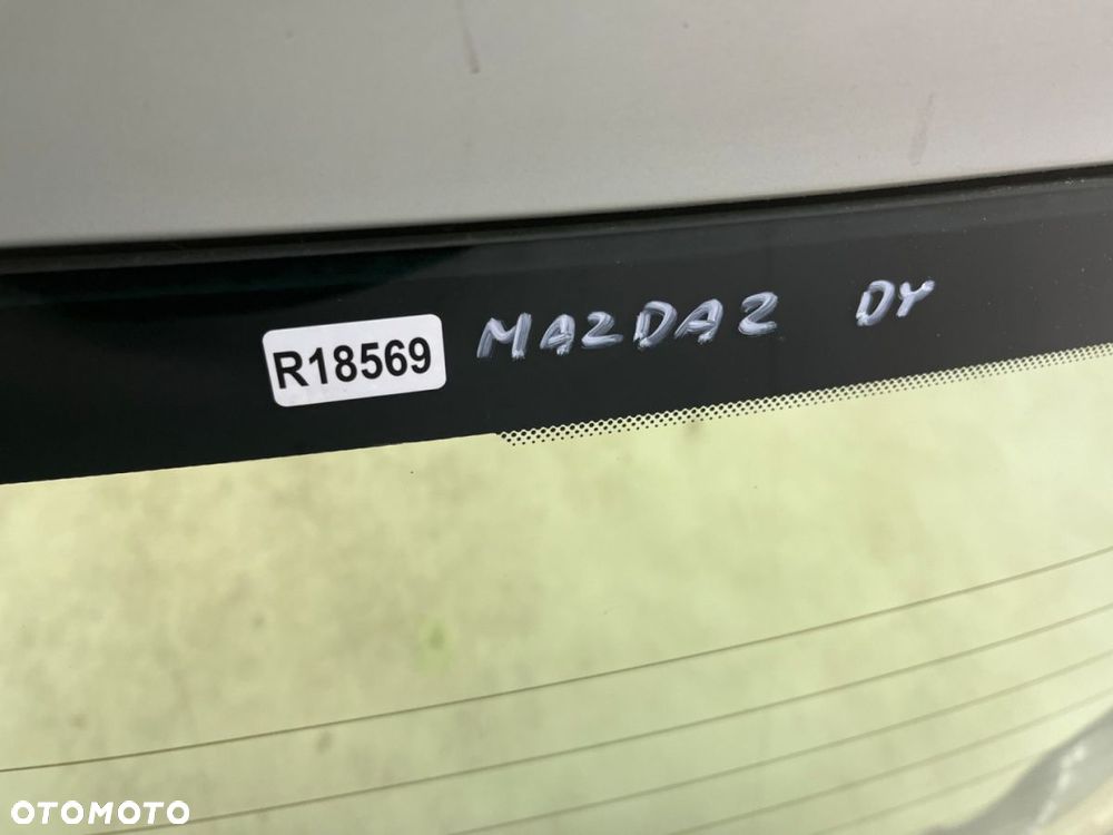 Szyba tylna Mazda 2 DY 03-07r. tylna w klapę bagażnika oryginalna - 8