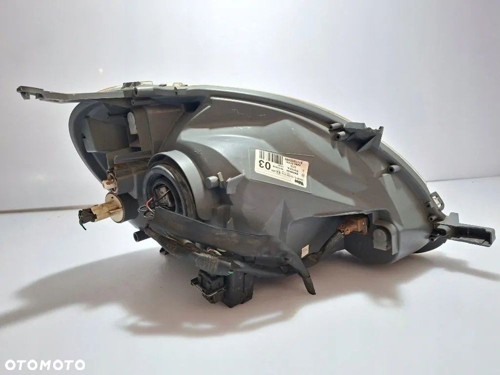 TOYOTA YARIS I LAMPA REFLEKTOR LEWY PRZÓD EUROPA 89008658 811700D080 - 9