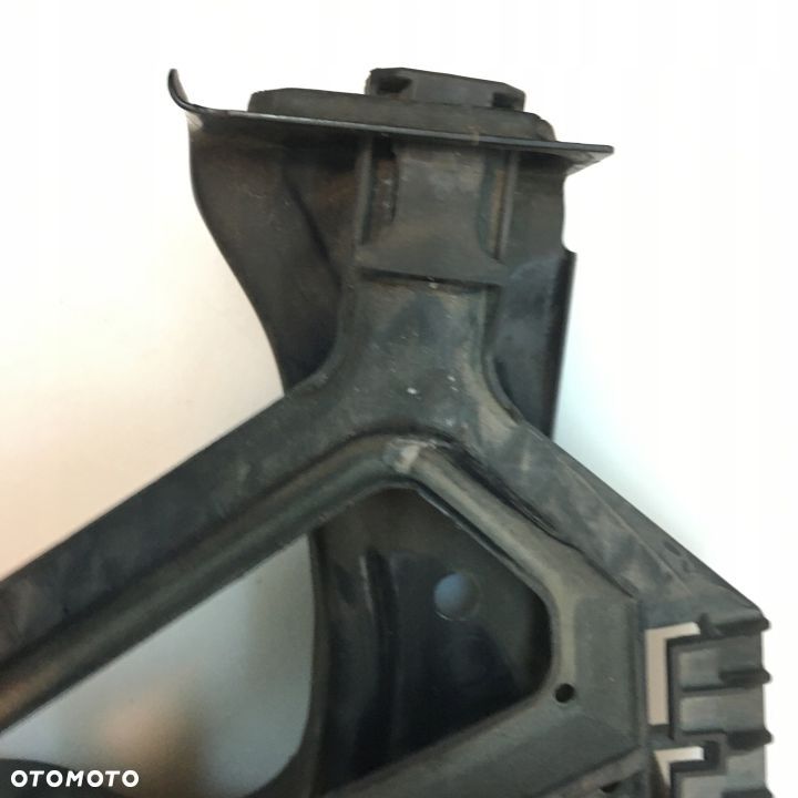 ŚLIZG LAMPY LEWY PRZÓD SKODA OCTAVIA II 1Z0941339 - 9