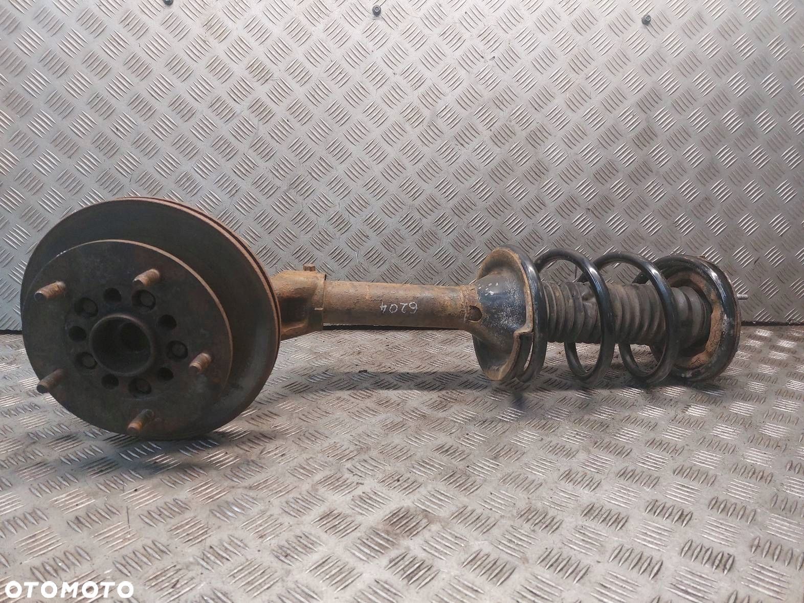 AMORTYZATOR SPRĘŻYNA ZWROTNICA LEWY PRZÓD  FORD TRANSIT V 2.0 DI - 1