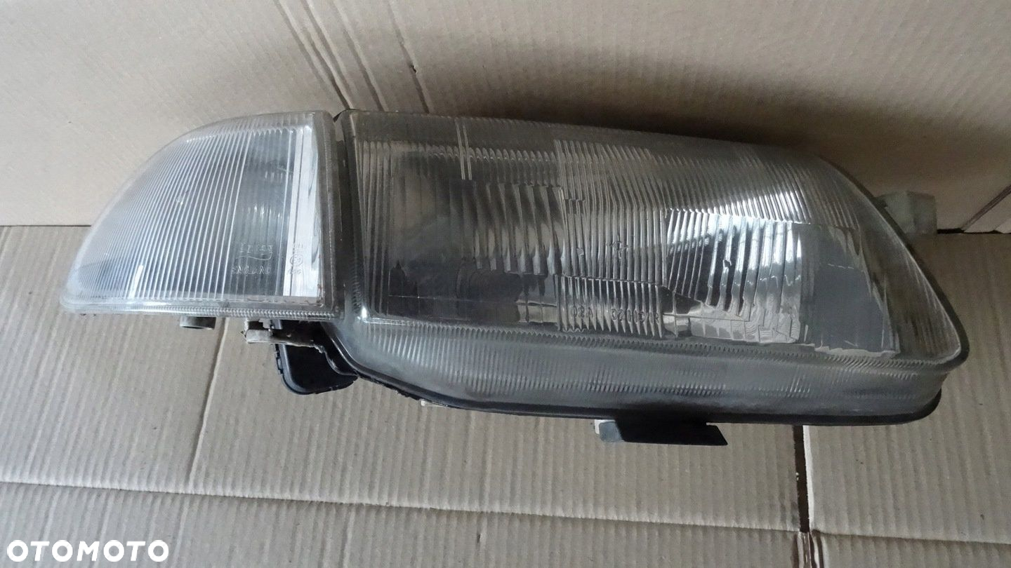 ASTRA 1 I F REFLEKTOR PRAWY PRZÓD 90383783 - 3