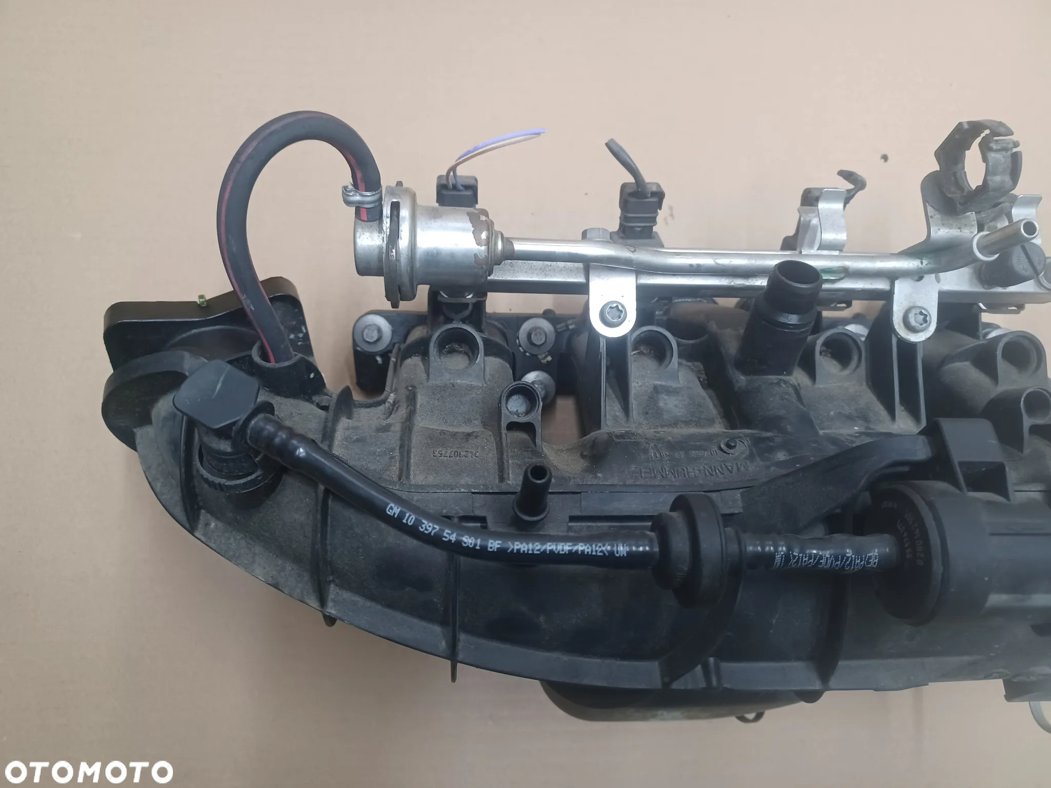 KOLEKTOR SSĄCY OPEL 1.4 T 55573171 - 9