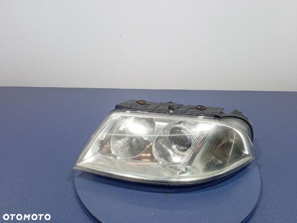 VW PASSAT B5 LIFT REFLEKTOR LEWY LAMPA PRZÓD  206244 - 1