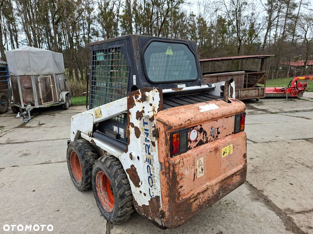 Bobcat 553 4X4 + Melroe Ingersoll-Rand 725S B/H - 8
